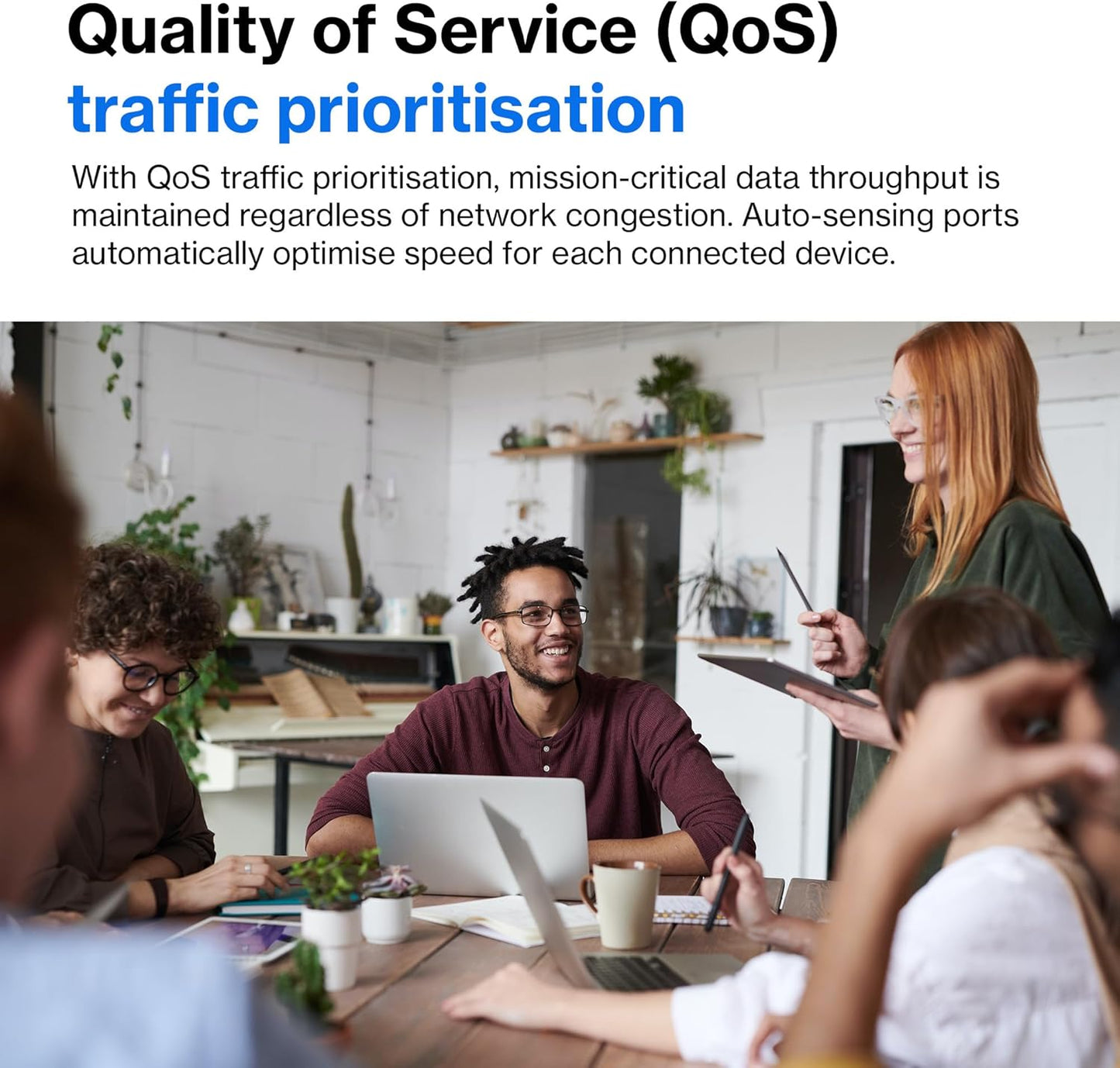Group of people in a meeting with text about QoS traffic prioritization.